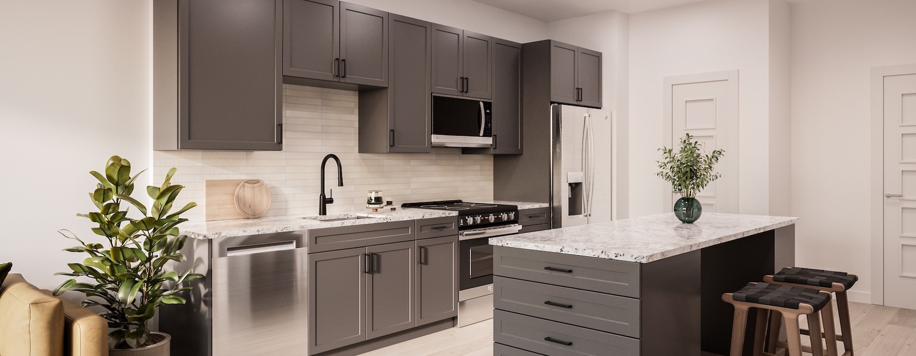 a kitchen with dark cabinets and an island